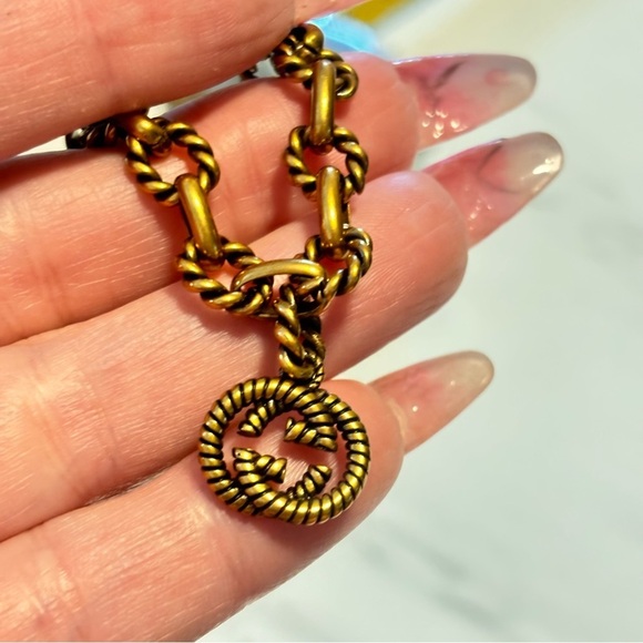 Fancy Link Chain
Antique Gold Finish
Bracelet With Double G
Motif 7” - Picture 8 of 11